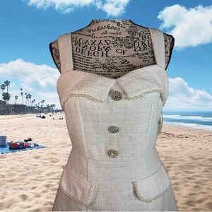 White Mini Dress with silver art hardware buttons + faux pockets. No‎ tags